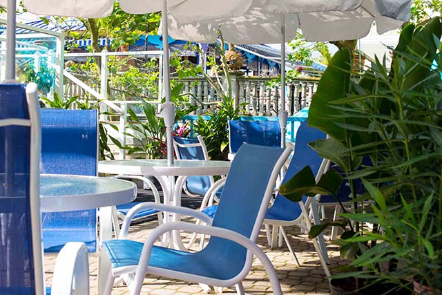 Relax poolside and enjoy a bite to eat from the Caribbean Pool Bar