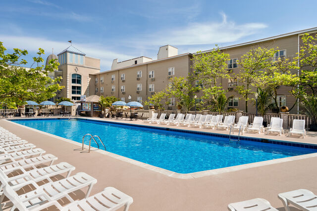 Cool off by the refreshing outdoor pool, just a set of stairs away from the beach and boardwalk.