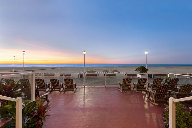 Front row seats to the beach, boardwalk, and ocean waves.