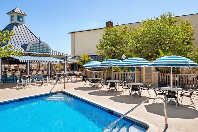 The vacation essentials: Hot food, cold drinks, and relaxation by the pool.