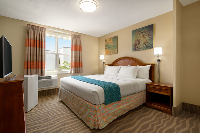 hotel room showing a bed and a window