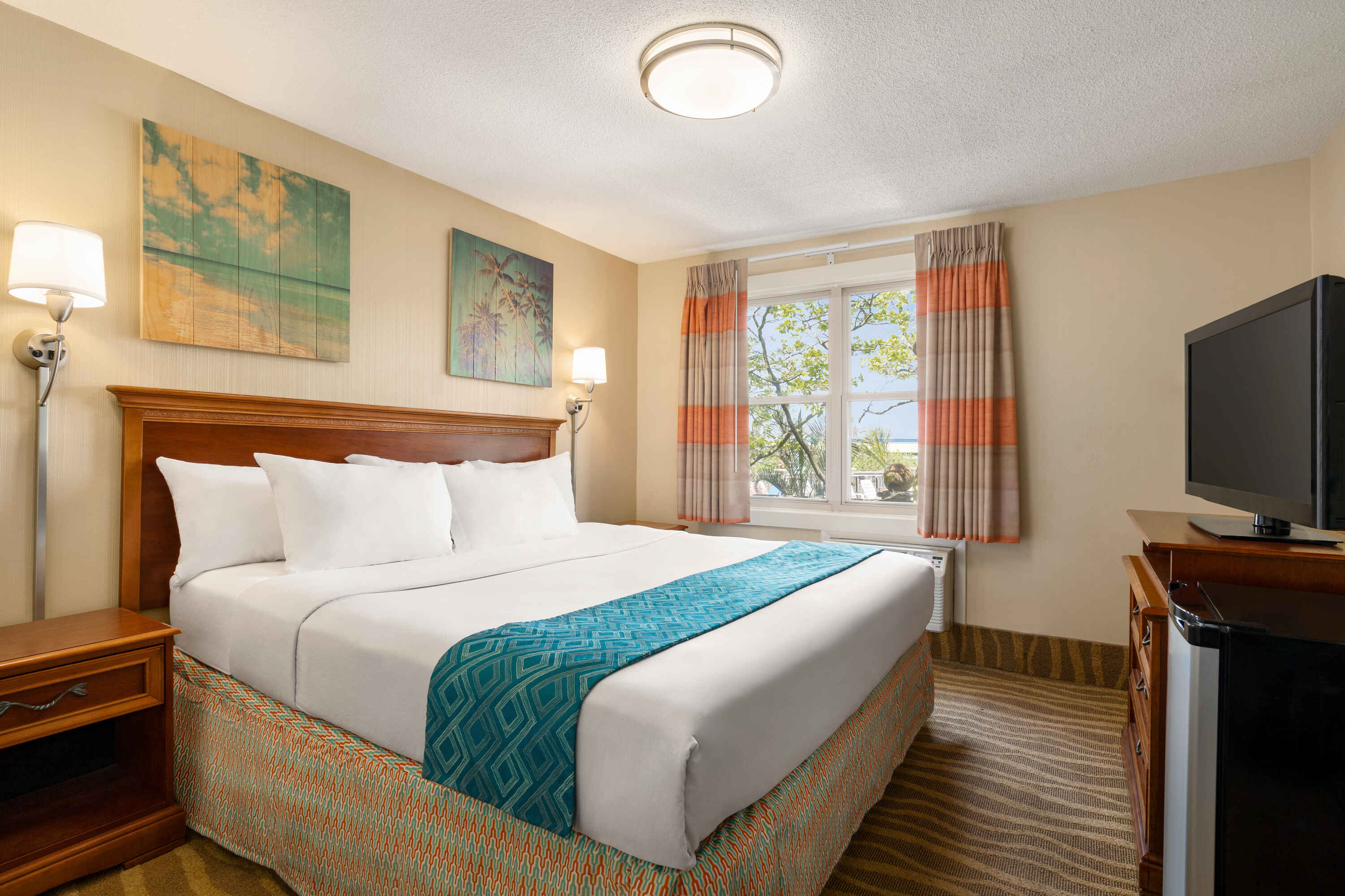 hotel room showing a bed and a window